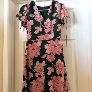 Jcrew Dress. Worn once. Hits just above knee. Zips in back. Sleeves tie together